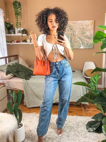 80s curly bangs are back check out this retro trend artofit