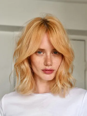 shoulder length 90 s inspired layers on peach blonde hair co