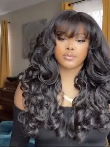 natural black curly hairstyles with bangs