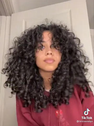 18 ways to rock curtain bangs on curly hair artofit
