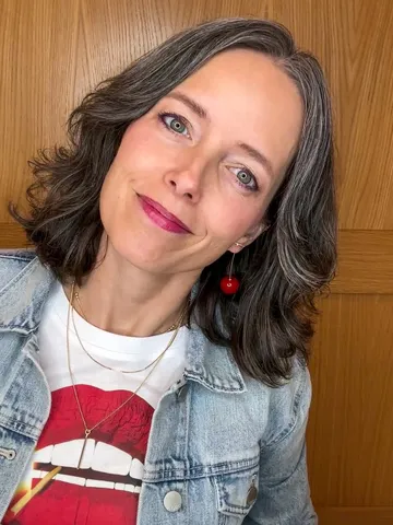 why curtain bangs are the best face framing cut for women ov