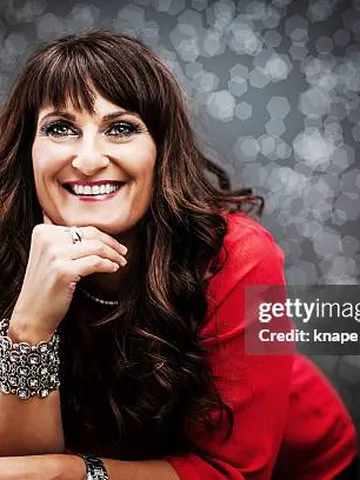 mature woman with bangs photos and premium high res pictures