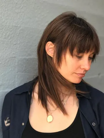 we love this fashion mullet hair cut with bangs by aveda art