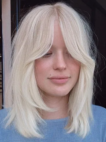 30 Trendy Curtain Bangs You'll Be Seeing Everywhere in 2024