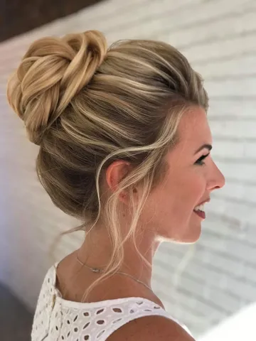 wedding hairstyle high bun on highlighted blonde hair brides