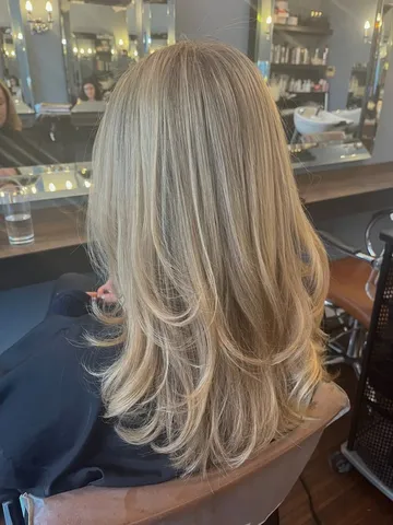 long layers hairstyle warm blonde hair hair highlights blond