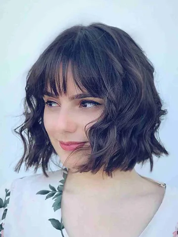curly bob haircut with bangs