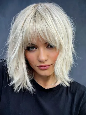 35 Trendy Choppy Bob with Bangs for a Modern Beachy Style