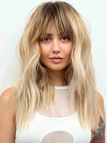 33 Chic and Edgy Styles Featuring Choppy Bangs for Women