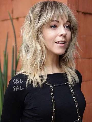 Side Swept Bangs With Choppy Layers