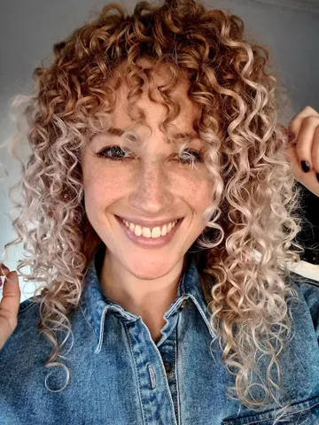 choppy bangs with curly hair