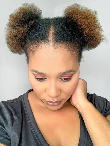 35 prettiest natural hair bun styles you ll want to copy