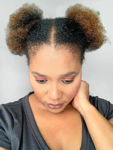 35 prettiest natural hair bun styles you ll want to copy