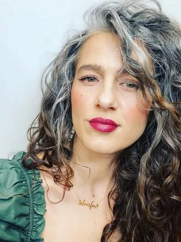 long curly grombre hair gray hair growing out grey hair