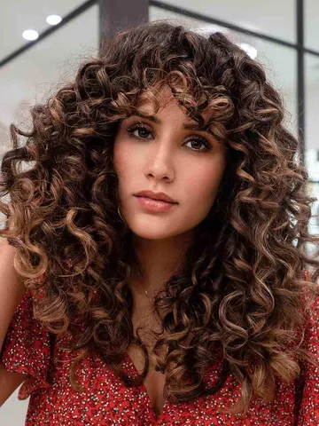 long layered haircuts with bangs for wavy hair