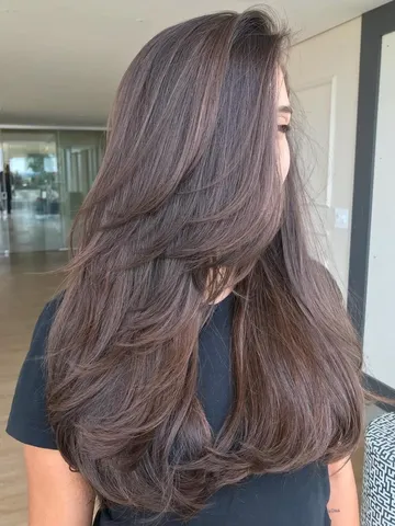 layered haircuts for thick long hair