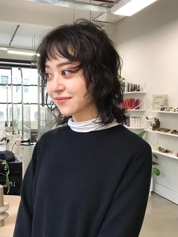 a wavy wolf cut is the combination of chic and wild you need