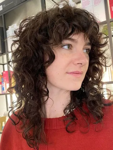 18 fabulous wolf cut styles to enhance your curly and wavy l