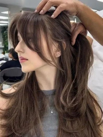 24 wispy curtain fringe hairstyles for long hair to inspire