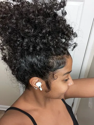 simple messy curly hair bun curly bun hairstyles messy curly