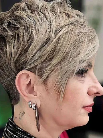 44 modern pixie cut with bangs for a face framing effect