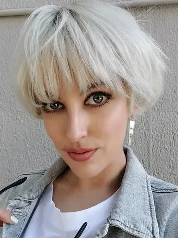 long pixie haircut with bangs defying the odds with 37 unbea