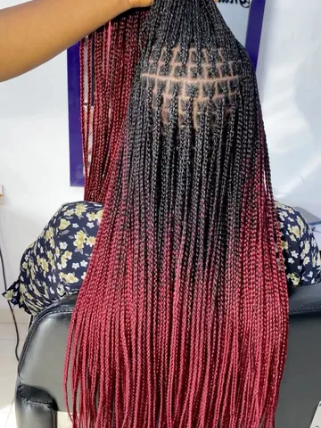 four looks that ll make you want red box braids twists artof