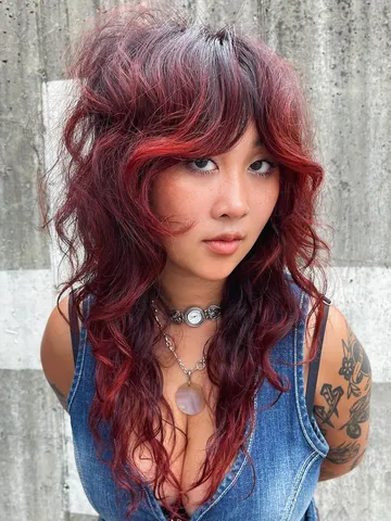 a wavy wolf cut is the combination of chic and wild you need