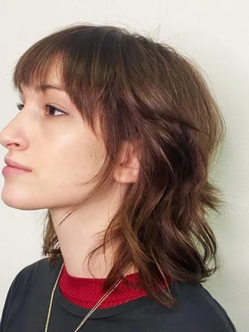 the wolf cut on curly hair is the modern iteration of the sh