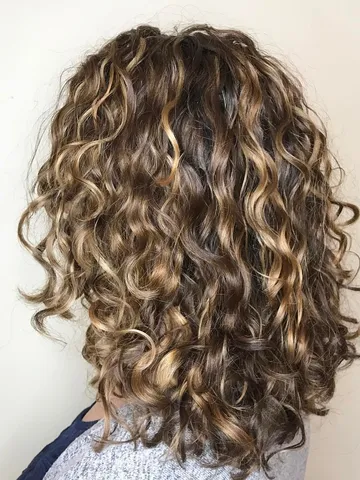 wavy curly hair ideas for 2026 the right hairstyles